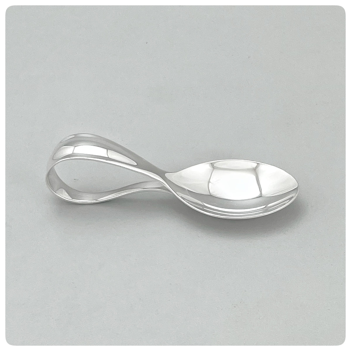 Loop fork and spoon baby set in sterling silver.